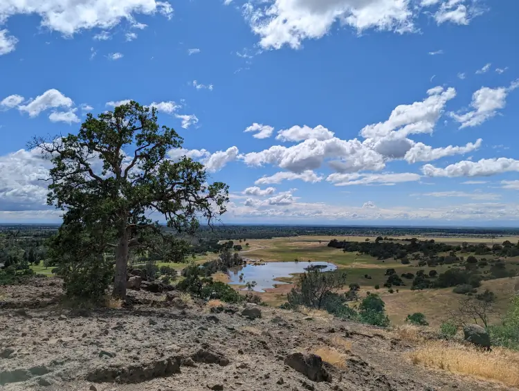 A photo taken from atop Monkey Face overlooking Horseshoe Lake and an amazing vista of Chico.